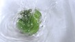 Pepper falling into water in super slow motion