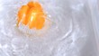Peppers falling into water in super slow motion