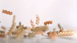 Pasta coils falling down in super slow motion