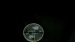 Bubble hitting nail in super slow motion