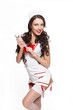 Photo: Sexy surprised smiling female doctor in red lingerie Sexy surprised smiling female doctor in red lingerie