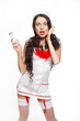 Photo: Sexy surprised smiling female doctor in red lingerie Sexy surprised smiling female doctor in red lingerie