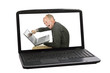 Angry businessman in screen from a laptop