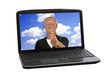 Happy guy showing thumbs up in screen of a laptop