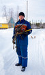 Photo: The worker-electrician in blue overalls The worker-electrician in blue overalls