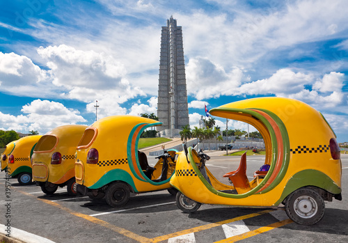 Photo: Typical cuban coconut shaped taxis in Havana Typical cuban coconut shaped taxis in Havana