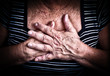 Photo: Aged woman's hands over her chest Aged woman's hands over her chest