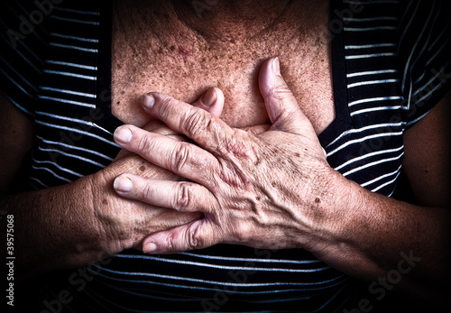 Photo: Aged woman's hands over her chest Aged woman's hands over her chest