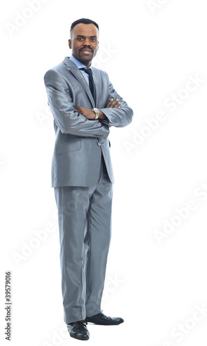 Photo: Full length portrait of a happy businessman standing Full length portrait of a happy businessman standing