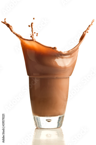 Photo: Chocolate splashing into glass Chocolate splashing into glass