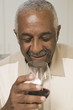 Photo: Man drinking glass of wine Man drinking glass of wine