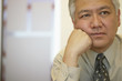 Businessman relaxing on fist
