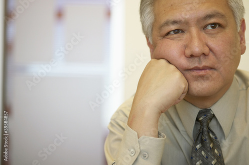 Photo: Businessman relaxing on fist Businessman relaxing on fist