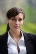Portrait of young woman in suit