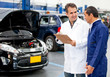 Mechanics at a car garage