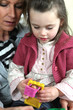 grandmother and granddaughter playing