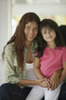 Portrait of mother and young daughter