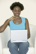 Woman with laptop in lap