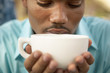 Photo: Close up of man drinking coffee Close up of man drinking coffee