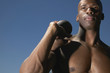 Portrait of man with shot put