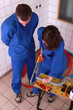 high-angle view of two workers