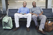 Portrait of two men at airport