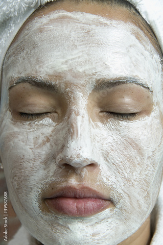 Photo: Close up of woman with beauty mask on face Close up of woman with beauty mask on face