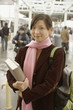 Portrait of teenage girl with books