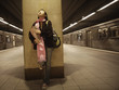 Teenage girl waiting for subway