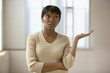 Woman with hand in air