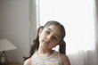 Girl with head tilted