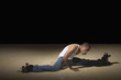 Man doing splits on roller skates