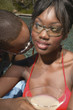 Couple kissing at swimming pool