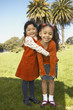 Portrait of young girls hugging
