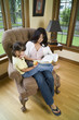 Mother reading to daughter