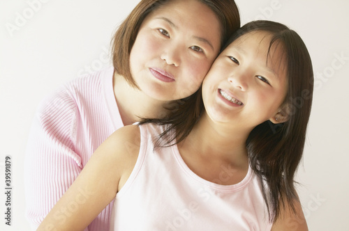 Photo: Portrait of a mother and her daughter Portrait of a mother and her daughter