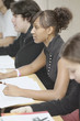 Four high school students in classroom