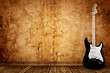 Electric guitar and the wall