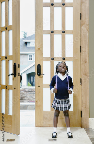 Photo: Girl by open doorway Girl by open doorway
