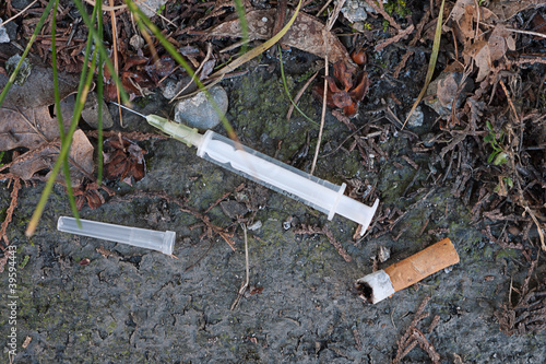 Photo: Syringe in gutter Syringe in gutter