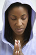 African American woman praying