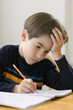 Young boy doing homework