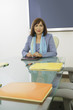 Businesswoman sitting at a conference table