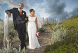 Newlyweds walking on the beach