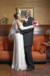 Newlywed couple posing for the camera