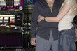 Couple hugging in a casino