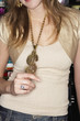 Young woman wearing a pendant and sunglasses