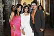 Family in eveningwear smiling for the camera