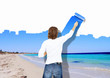 Young man with paint brush and nature landscape Young man with paint brush and nature landscape