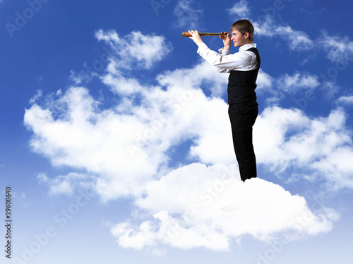 Illustration: Young businessman looking into the uture Young businessman looking into the uture